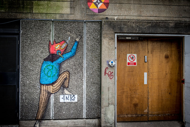 Street art illustration with characters interacting around a door